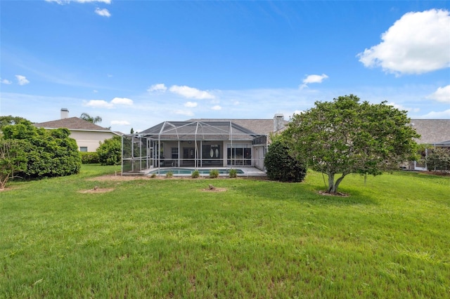 8921 Kilmer Way, Hudson, FL 34667 - rear view of house with a yard