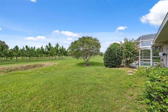 8921 Kilmer Way, Hudson, FL 34667 - view of green lawn with glass enclosure
