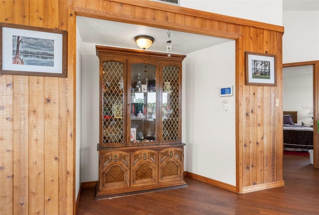 13825 San Juan Ave, Hudson, FL 34667 - wine room with wood finished floors and baseboards