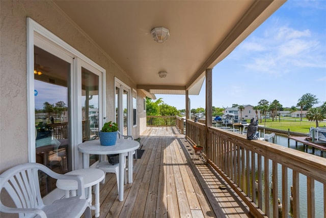 13825 San Juan Ave, Hudson, FL 34667 - wooden deck featuring a water view