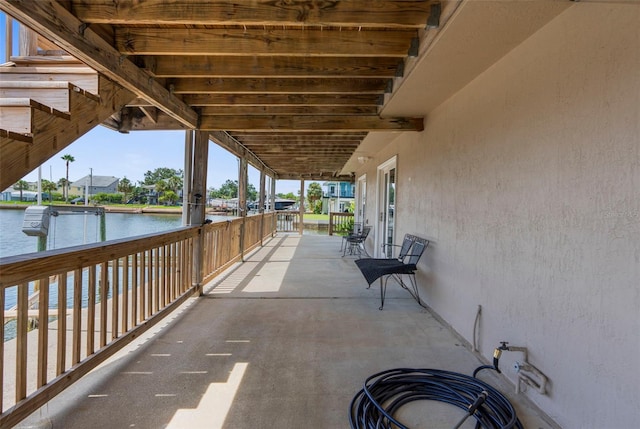 13825 San Juan Ave, Hudson, FL 34667 - view of patio / terrace featuring a water view