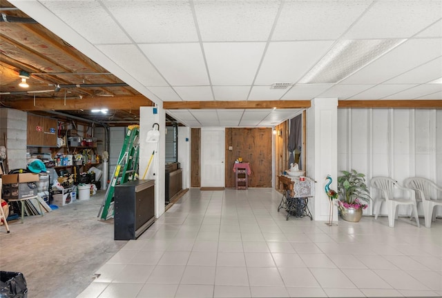 13825 San Juan Ave, Hudson, FL 34667 - basement featuring a drop ceiling