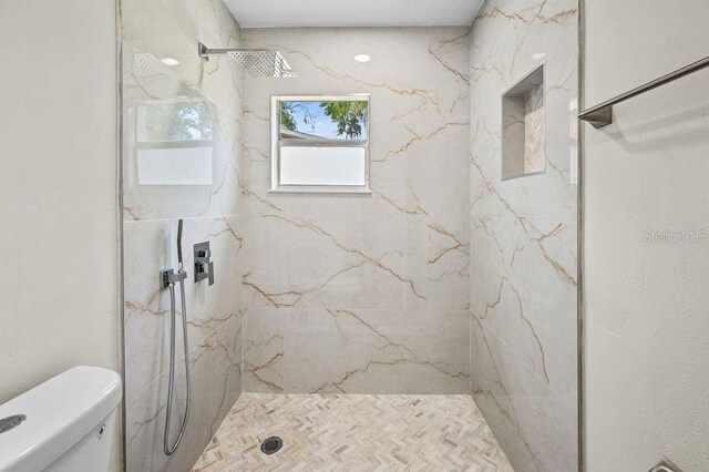 4905 Toni Ave, Lakeland, FL 33812 - full bath featuring toilet and a marble finish shower
