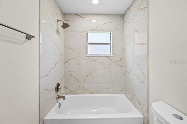 4905 Toni Ave, Lakeland, FL 33812 - full bathroom featuring toilet and shower / bathtub combination