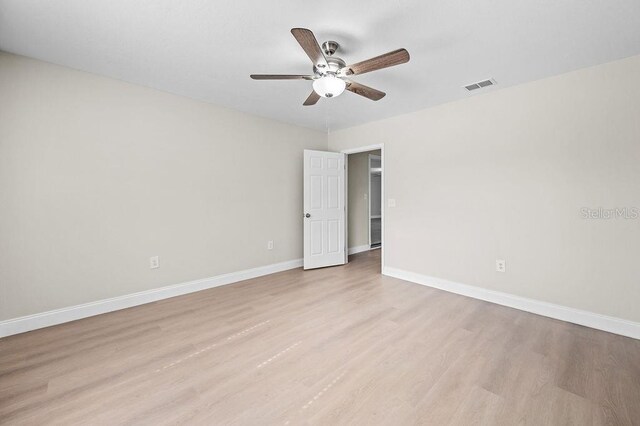 4905 Toni Ave, Lakeland, FL 33812 - unfurnished room featuring ceiling fan and light wood-style flooring