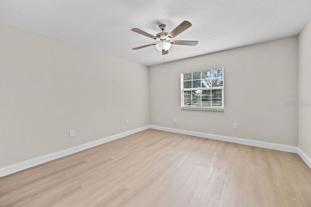 4905 Toni Ave, Lakeland, FL 33812 - spare room with light wood-style floors and a ceiling fan