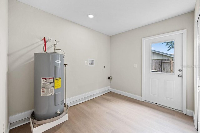 4905 Toni Ave, Lakeland, FL 33812 - utility room featuring electric water heater