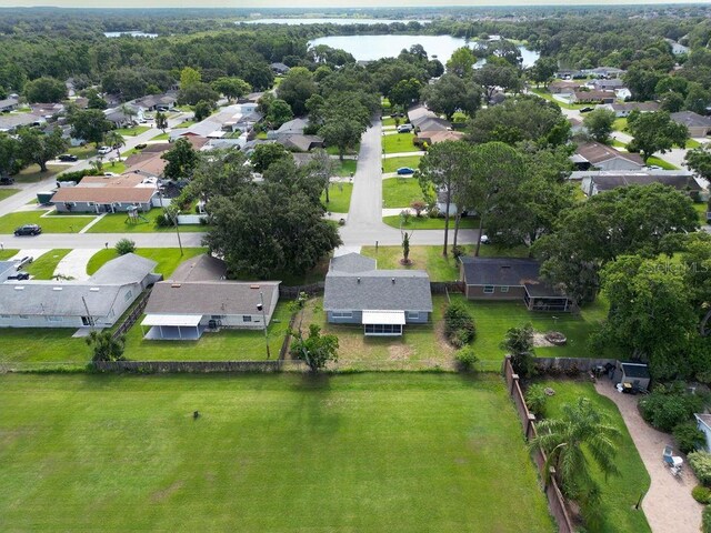 4905 Toni Ave, Lakeland, FL 33812 - aerial perspective of suburban area with a nearby body of water