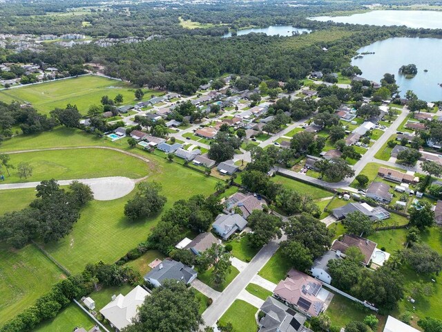 4905 Toni Ave, Lakeland, FL 33812 - aerial view of property and surrounding area featuring a nearby body of water and nearby suburban area