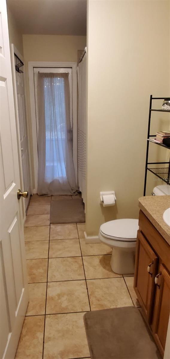 7689 N Galt Pt, Dunnellon, FL 34434 - full bathroom with vanity and tile patterned flooring