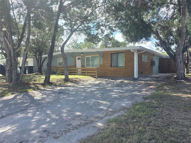 6730 Sandra Dr, Port Richey, FL 34668 - view of front of home featuring cooling unit and driveway