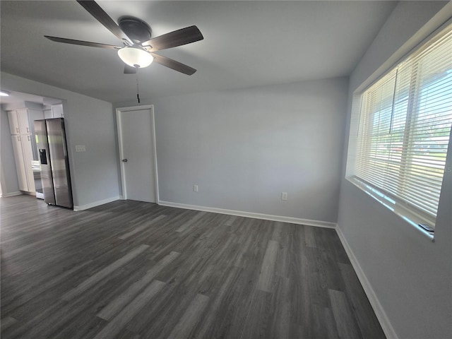 6730 Sandra Dr, Port Richey, FL 34668 - empty room featuring dark wood-style floors and a ceiling fan