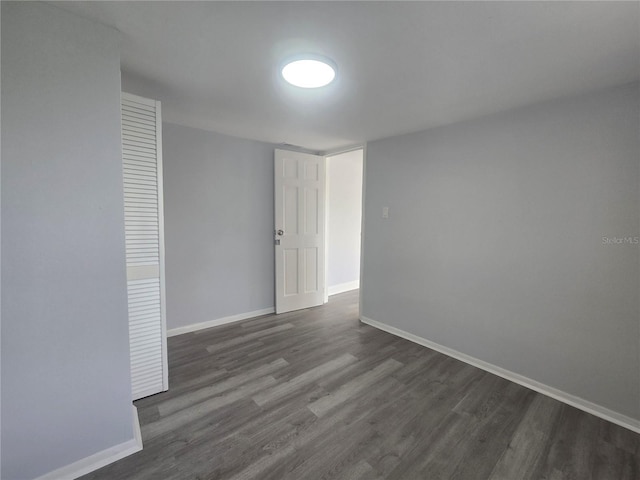 6730 Sandra Dr, Port Richey, FL 34668 - unfurnished room with dark wood-type flooring