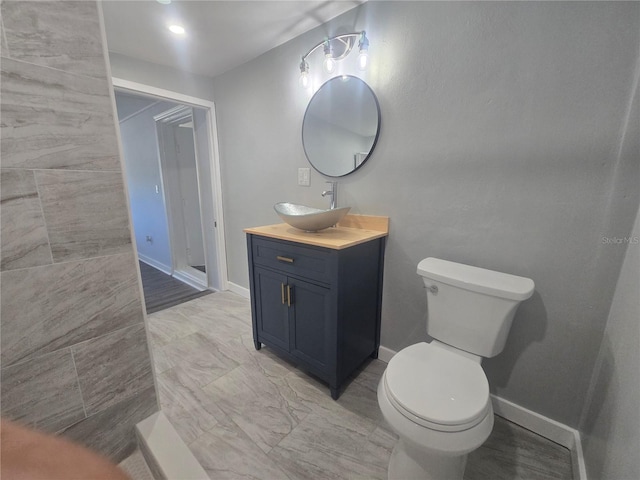 6730 Sandra Dr, Port Richey, FL 34668 - bathroom with vanity and toilet
