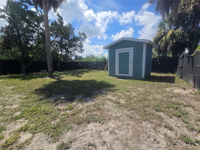 6730 Sandra Dr, Port Richey, FL 34668 - fenced backyard with a storage shed