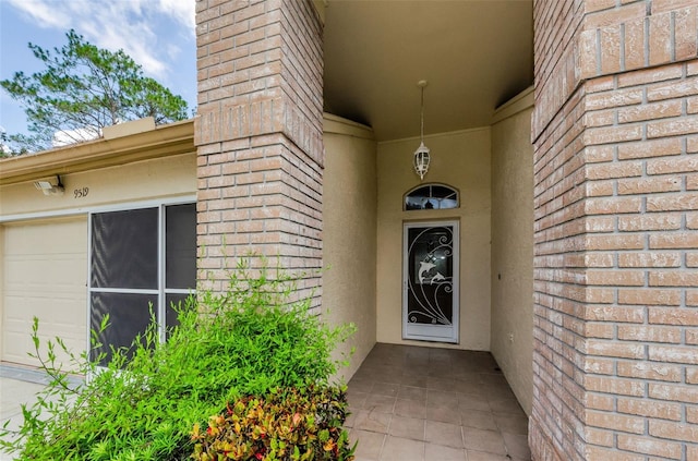 9519 Scenic Pine Ct, New Port Richey, FL 34655 - entrance to property featuring stucco siding and a garage