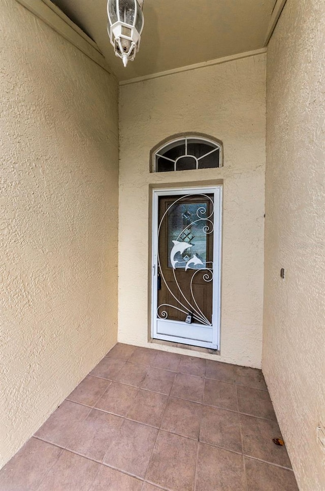 9519 Scenic Pine Ct, New Port Richey, FL 34655 - entrance to property featuring stucco siding