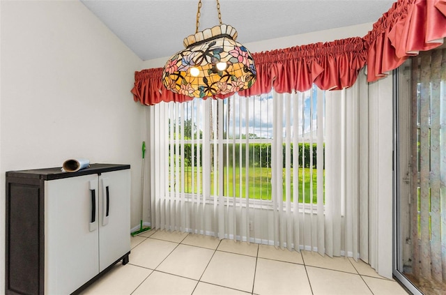 9519 Scenic Pine Ct, New Port Richey, FL 34655 - unfurnished dining area with tile patterned floors