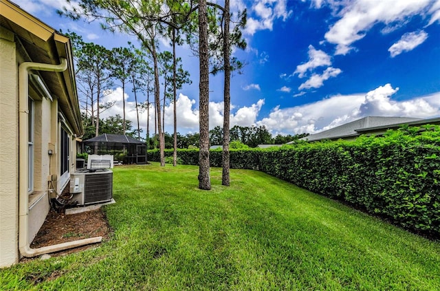 9519 Scenic Pine Ct, New Port Richey, FL 34655 - view of green lawn with a lanai