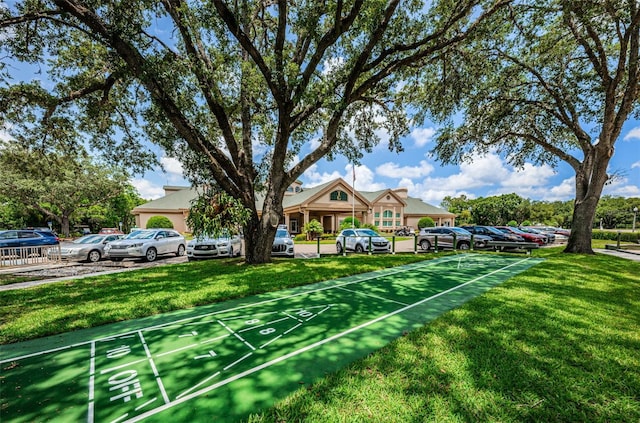 9519 Scenic Pine Ct, New Port Richey, FL 34655 - view of home's community featuring shuffleboard and a yard