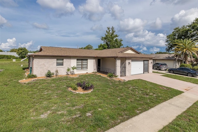 11127 Water Oak Dr, Port Richey, FL 34668 - ranch-style home featuring a garage, a front yard, concrete driveway, brick siding, and roof with shingles