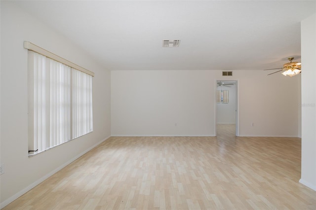 11127 Water Oak Dr, Port Richey, FL 34668 - spare room featuring light wood-style flooring and ceiling fan