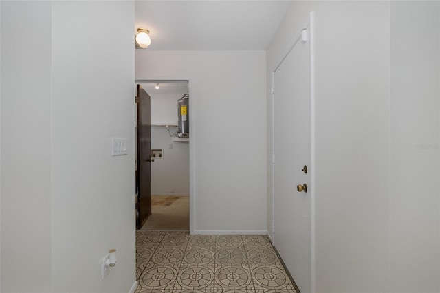 11127 Water Oak Dr, Port Richey, FL 34668 - hallway featuring baseboards