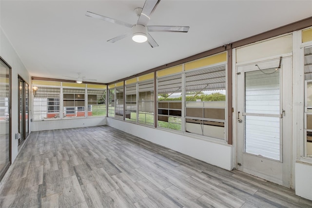 11127 Water Oak Dr, Port Richey, FL 34668 - unfurnished sunroom with ceiling fan