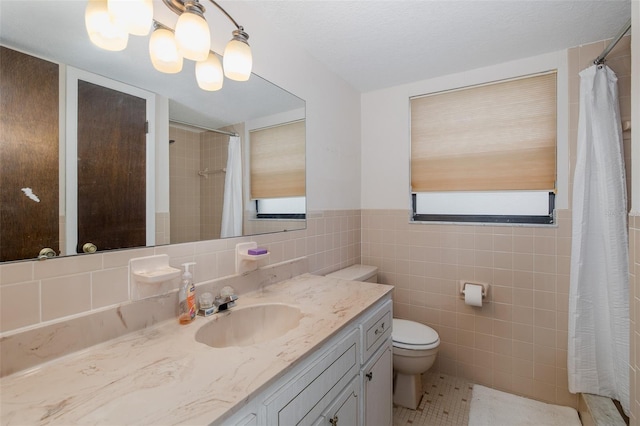 11127 Water Oak Dr, Port Richey, FL 34668 - bathroom with vanity, tile walls, and a shower with curtain