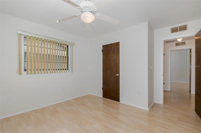 11127 Water Oak Dr, Port Richey, FL 34668 - unfurnished room with wood finished floors and ceiling fan
