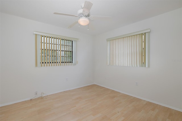 11127 Water Oak Dr, Port Richey, FL 34668 - unfurnished room with wood finished floors and ceiling fan