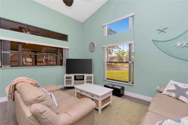 9626 Woodhollow Ct, New Port Richey, FL 34655 - living area with high vaulted ceiling and ceiling fan
