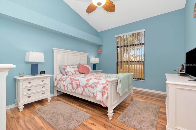 9626 Woodhollow Ct, New Port Richey, FL 34655 - bedroom featuring lofted ceiling, wood finished floors, and ceiling fan