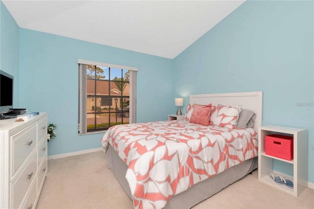 9626 Woodhollow Ct, New Port Richey, FL 34655 - bedroom featuring light carpet and lofted ceiling