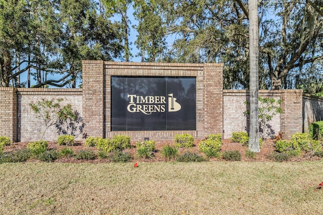 9626 Woodhollow Ct, New Port Richey, FL 34655 - community / neighborhood sign with a lawn