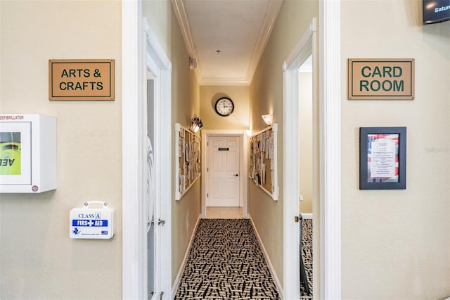 9626 Woodhollow Ct, New Port Richey, FL 34655 - hallway featuring crown molding and carpet flooring