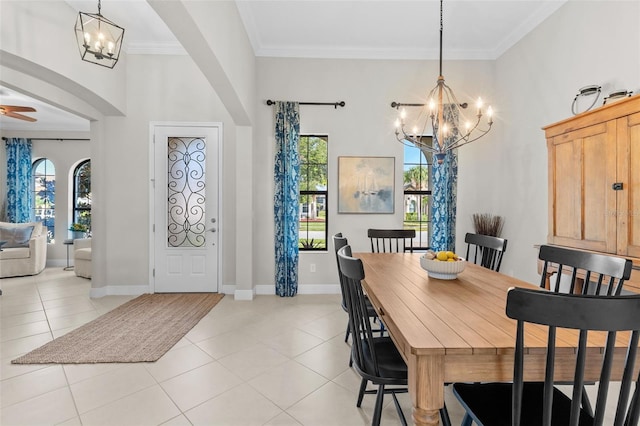 13208 Fawn Lily Dr, Riverview, FL 33579 - dining area with a chandelier, plenty of natural light, crown molding, and light tile patterned flooring