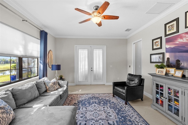 13208 Fawn Lily Dr, Riverview, FL 33579 - living area featuring tile patterned floors, plenty of natural light, ceiling fan, ornamental molding, and french doors