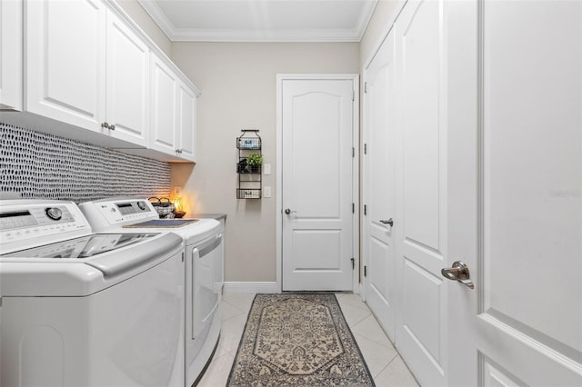 13208 Fawn Lily Dr, Riverview, FL 33579 - laundry room featuring cabinet space, separate washer and dryer, ornamental molding, and light tile patterned floors