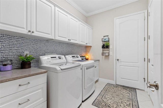 13208 Fawn Lily Dr, Riverview, FL 33579 - washroom featuring cabinet space, washing machine and clothes dryer, ornamental molding, and light tile patterned floors