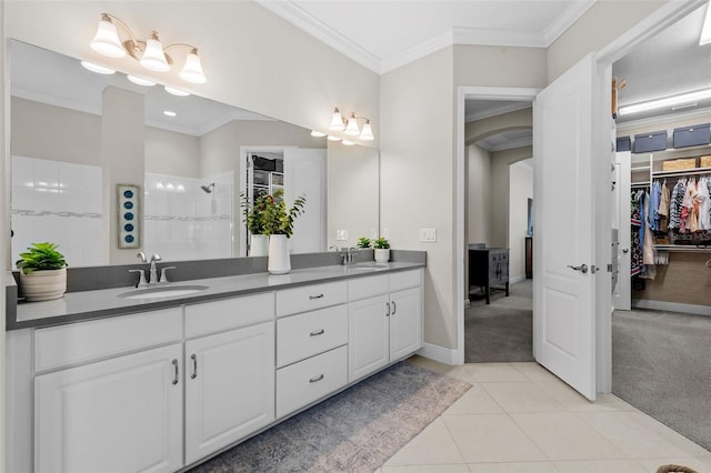 13208 Fawn Lily Dr, Riverview, FL 33579 - full bath featuring double vanity, crown molding, tile patterned flooring, tiled shower, and a walk in closet