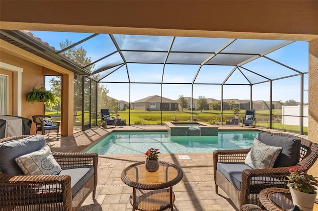 13208 Fawn Lily Dr, Riverview, FL 33579 - view of pool featuring a patio, a pool with connected hot tub, a lanai, and a residential view
