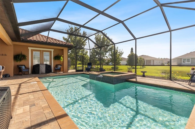 13208 Fawn Lily Dr, Riverview, FL 33579 - view of swimming pool with french doors, a patio, a lanai, and a pool with connected hot tub