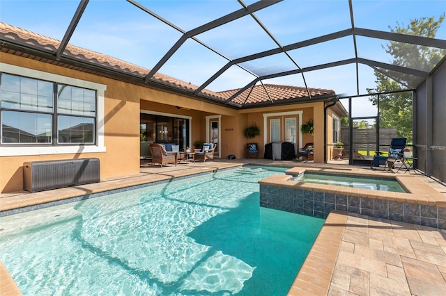 13208 Fawn Lily Dr, Riverview, FL 33579 - view of pool featuring a patio area, a pool with connected hot tub, a ceiling fan, french doors, and glass enclosure