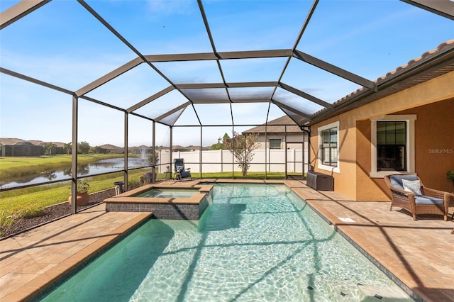 13208 Fawn Lily Dr, Riverview, FL 33579 - view of pool with a water view, a pool with connected hot tub, a patio area, and a lanai