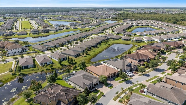 13208 Fawn Lily Dr, Riverview, FL 33579 - aerial overview of property's location featuring nearby suburban area and a large body of water