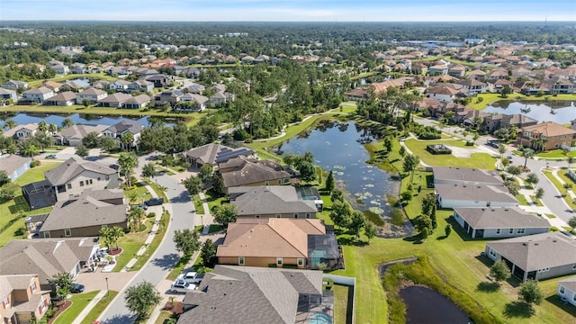 13208 Fawn Lily Dr, Riverview, FL 33579 - aerial view of property and surrounding area with nearby suburban area and a large body of water