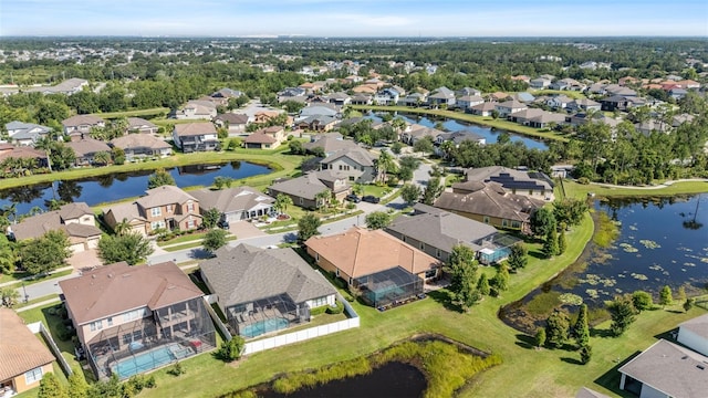 13208 Fawn Lily Dr, Riverview, FL 33579 - aerial view of property and surrounding area with nearby suburban area and a large body of water
