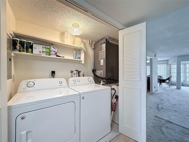 225 Country Club Dr Unit A203, Largo, FL 33771 - washroom with washer and dryer, light carpet, and a textured ceiling