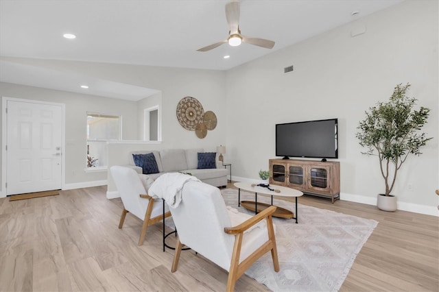 6529 Taylor Ct, New Port Richey, FL 34653 - living area featuring a ceiling fan, light wood-style floors, recessed lighting, and vaulted ceiling